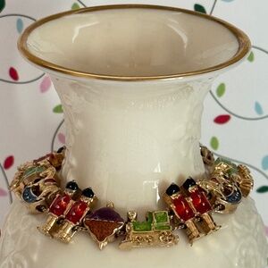 VINTAGE AVON (S.P.) Bracelet Holiday Slide Toy Charms Gold (7.5")